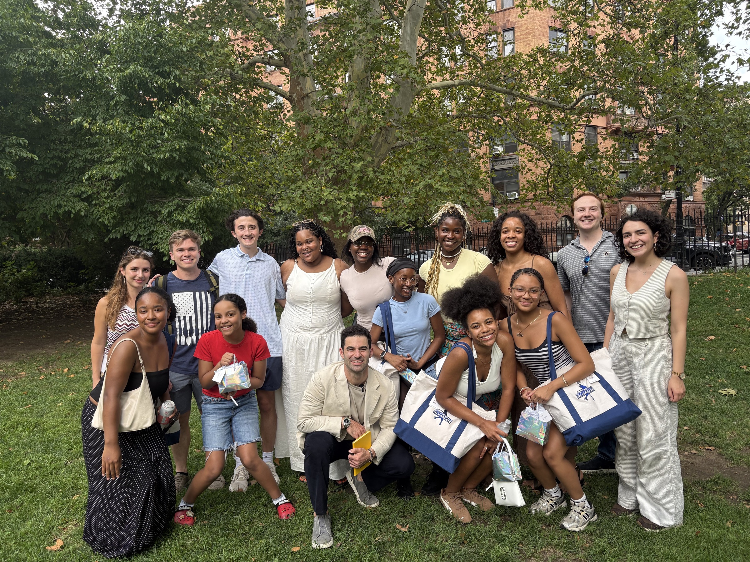 The team gathered outdoors with Figure Skating in Harlem, Teddy kneeling front center